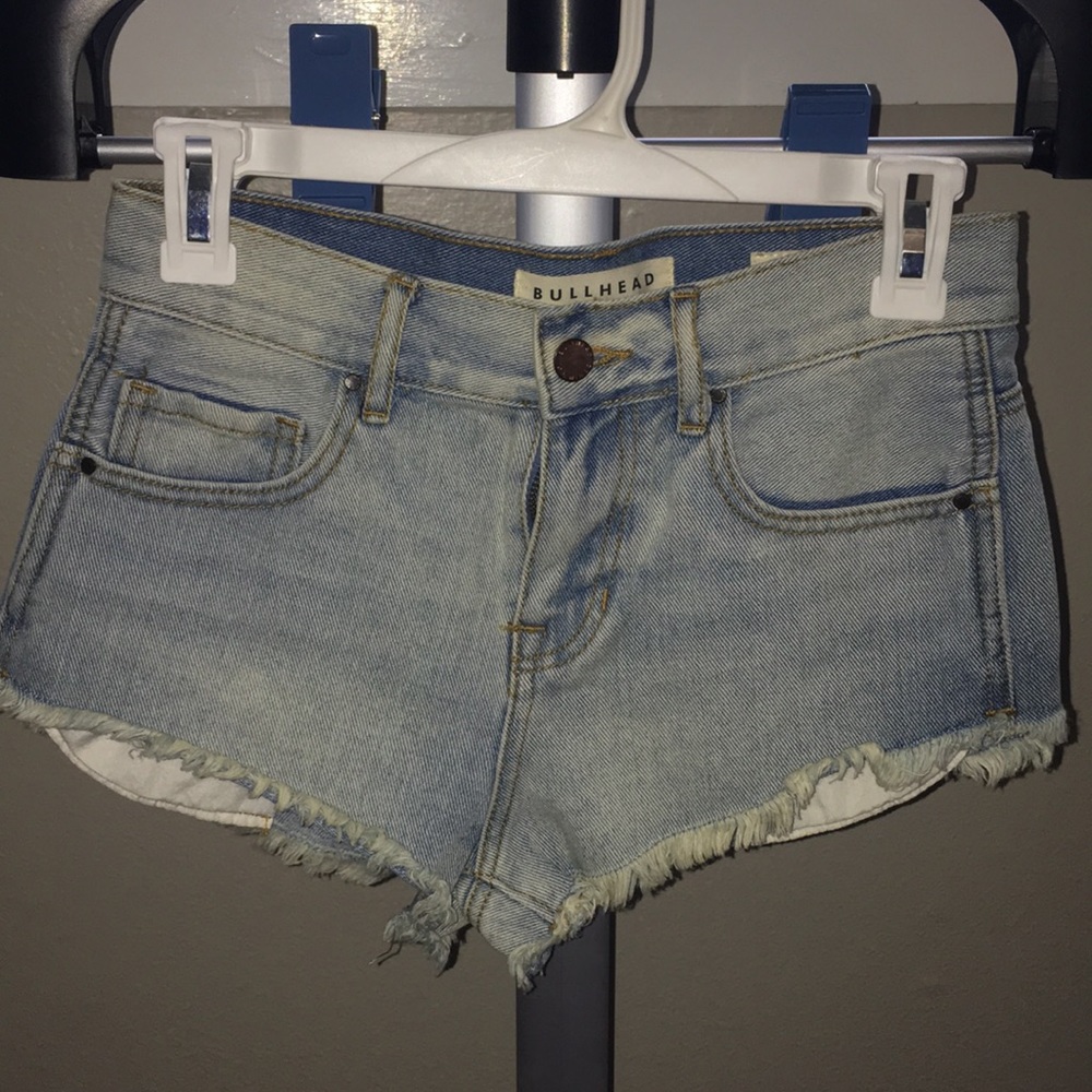 Bullhead high rise light wash jean shorts.